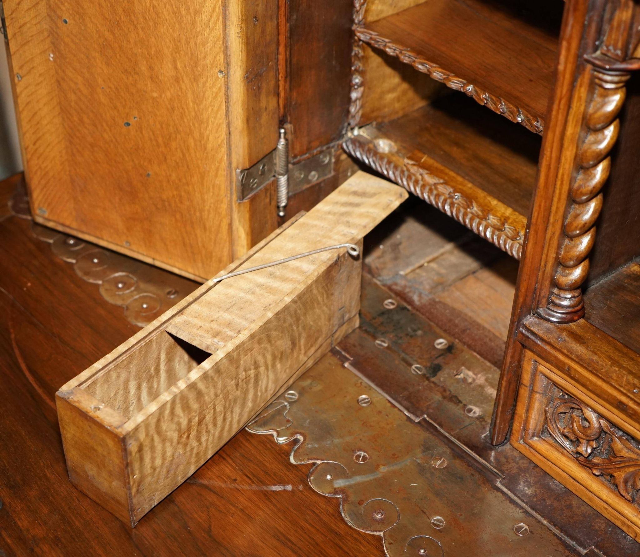18th-century carved Spanish cabinet with hidden storage.