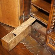 18th-century carved Spanish cabinet with hidden storage.