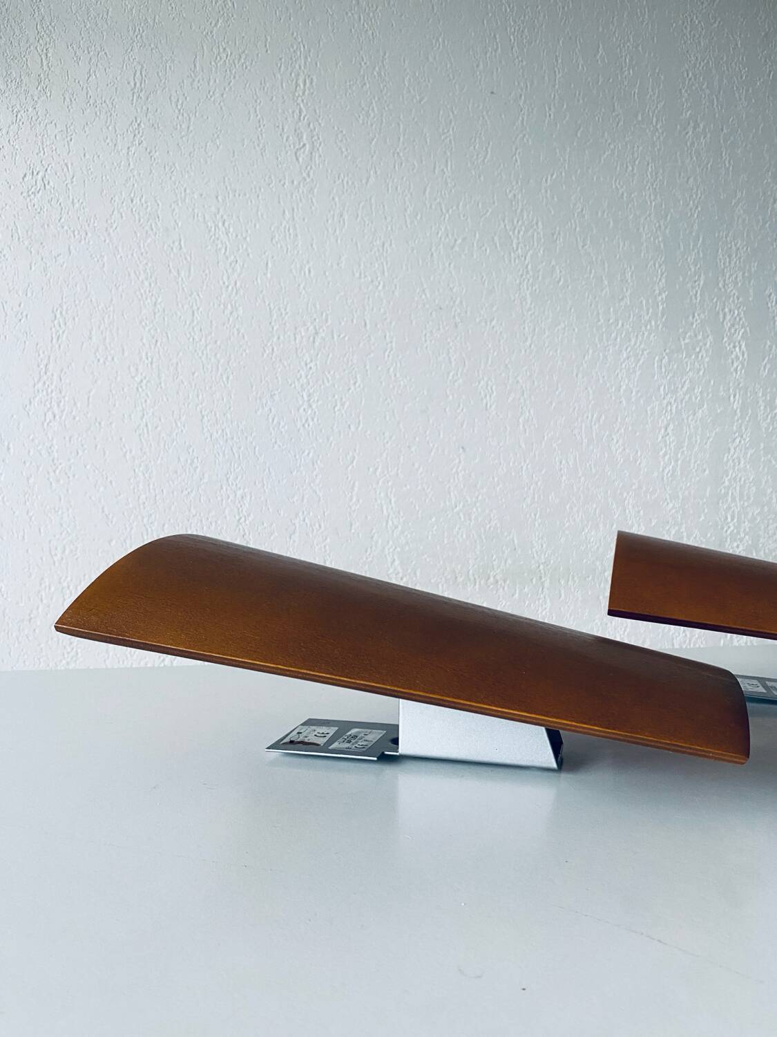 Pair of Lucid designer wall lights