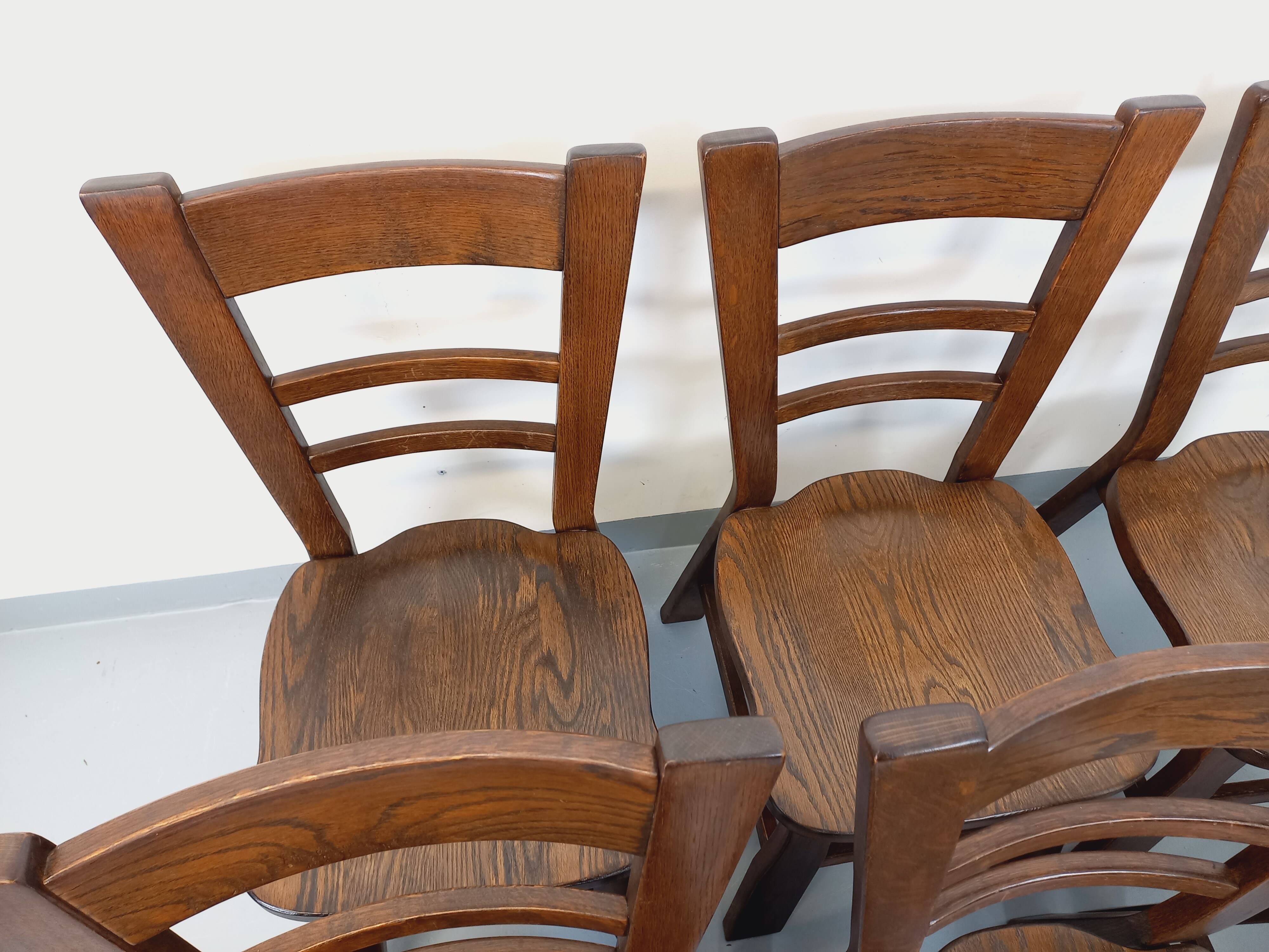 Set of 6 vintage brutalist oak chairs from the 1950s.