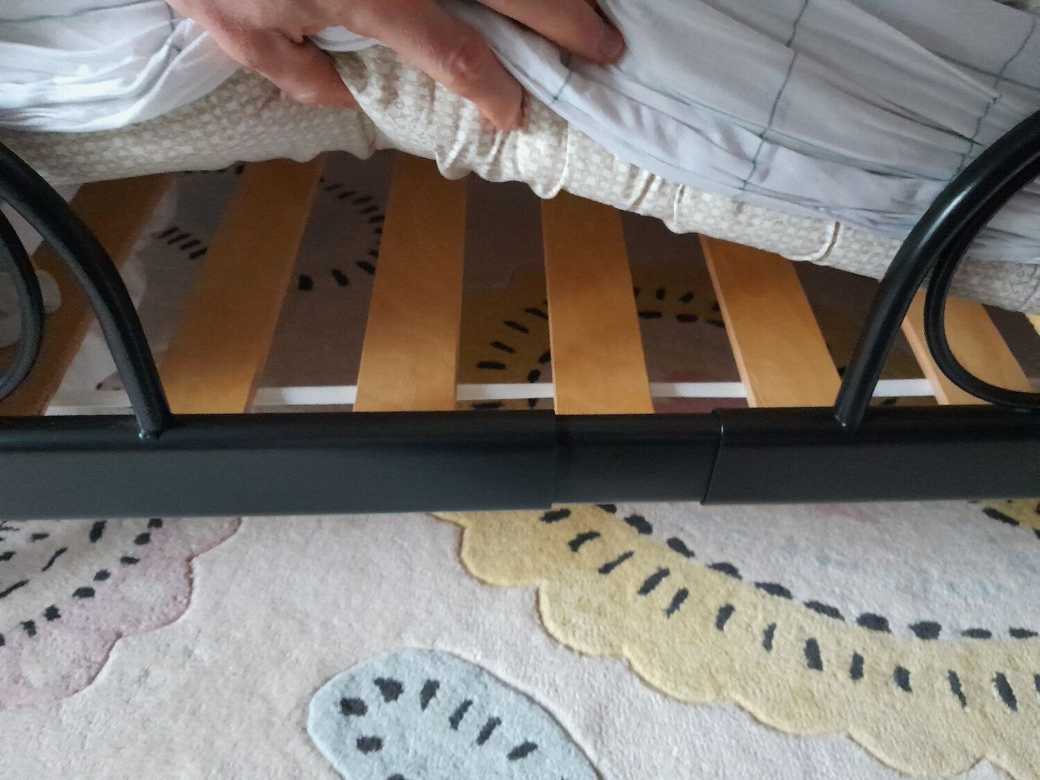 Scalable wrought iron bed with mattress