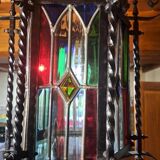 Wrought iron lantern with colored stained glass