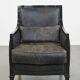 Armchair in black cowhide leather and wood with an Art Deco design