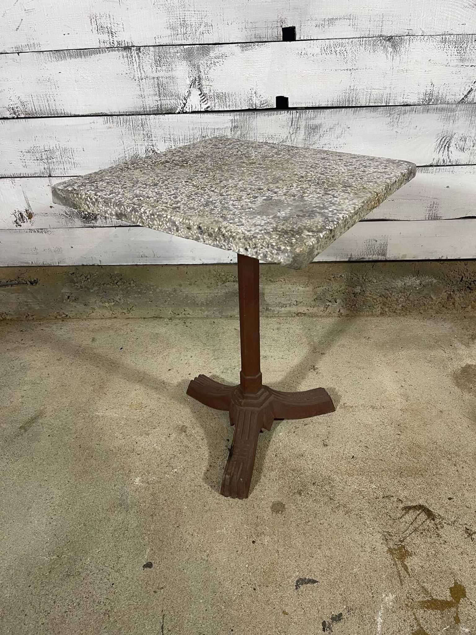 Bistro table with a cast iron base