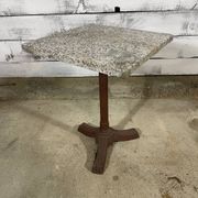 Bistro table with a cast iron base