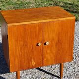 Vintage golden oak sideboard with conical legs from the 1950s