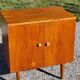 Vintage golden oak sideboard with conical legs from the 1950s