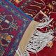 Vintage Afghan hand-knotted prayer rug with Islamic patterns.