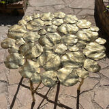 Carved brass coffee table with ginkgo decor