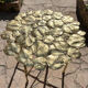 Carved brass coffee table with ginkgo decor