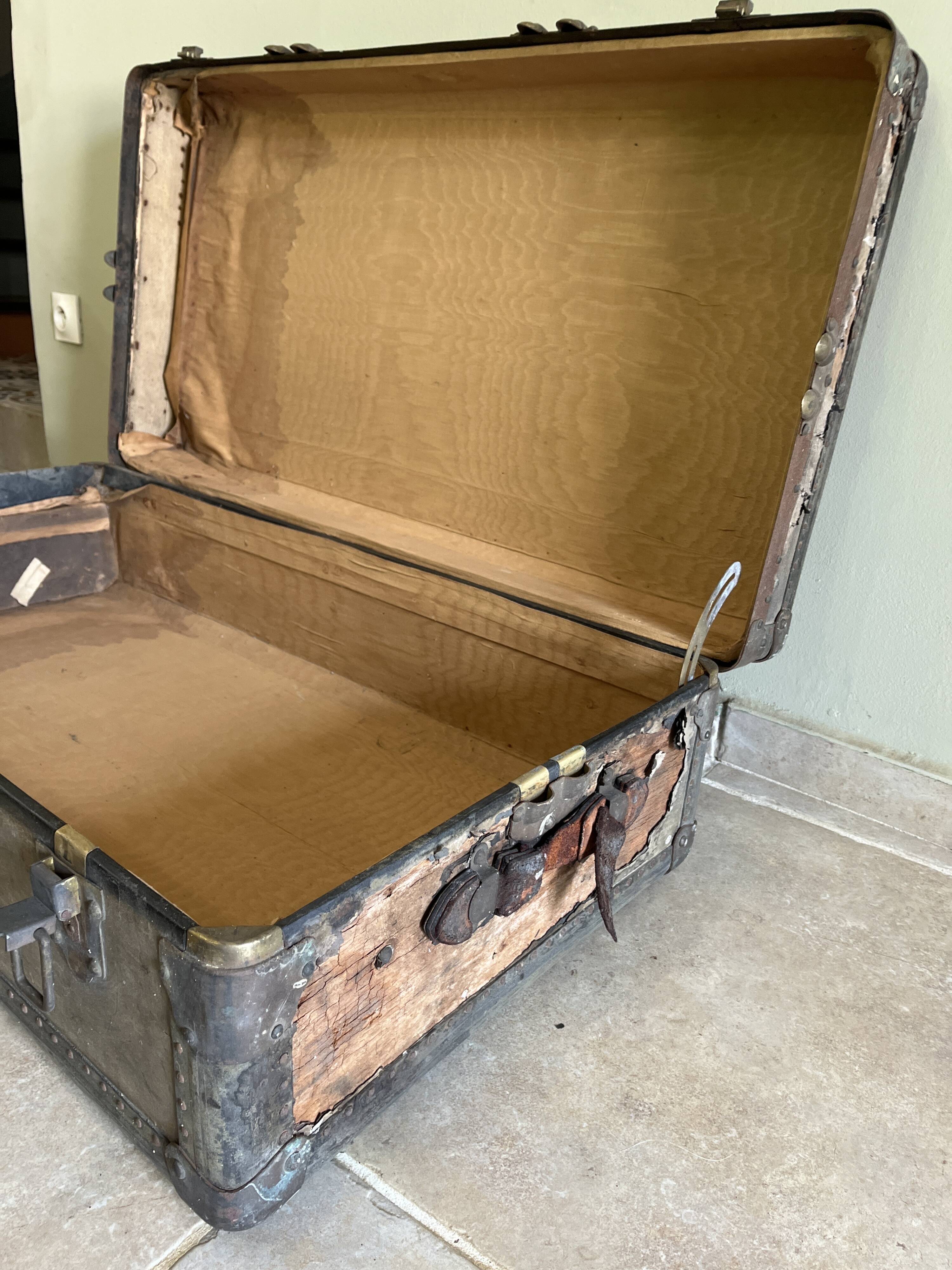 Large travel trunk from the early 20th century.