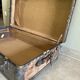 Large travel trunk from the early 20th century.