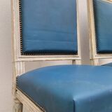 Pair of antique Louis XVI style chairs with patina