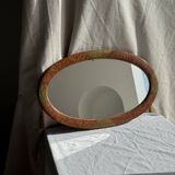 Small oval Art Deco mirror in brown and gold 33x54.