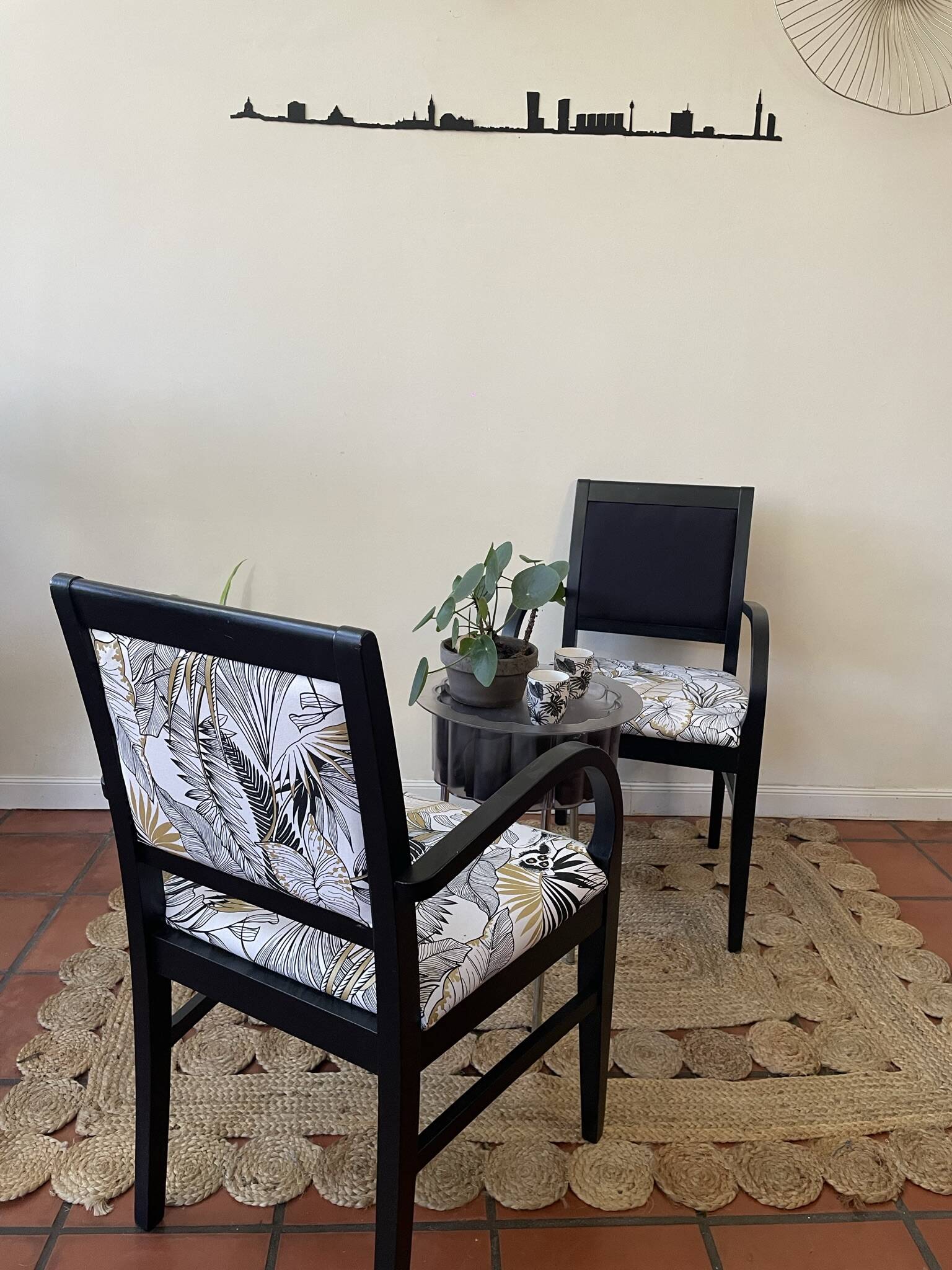 Black wooden armchair with golden leaves