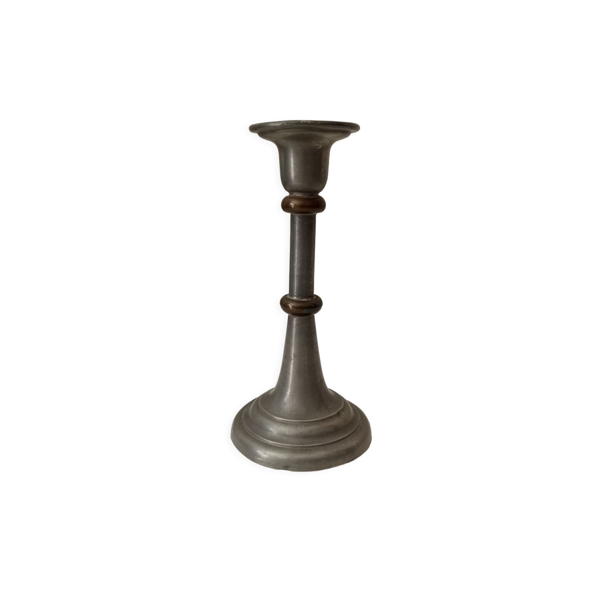 Antique candle holder in pewter and brass