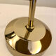 Vintage Fase adjustable wall lights in gold metal.
