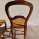 pair of Art Nouveau chairs, cane and faux leather
