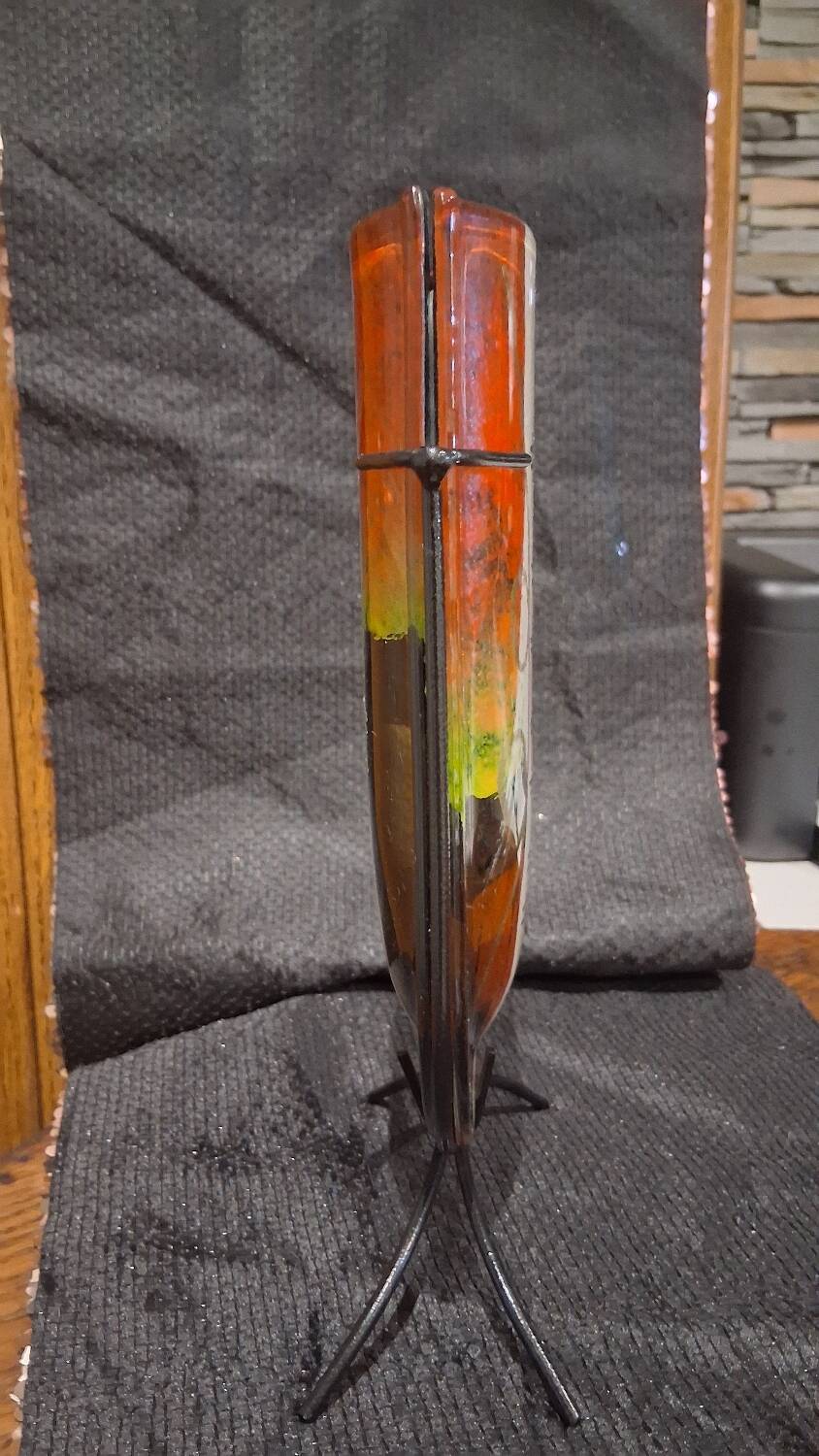 Multicoloured vase in the style of Dali.