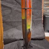 Multicoloured vase in the style of Dali.