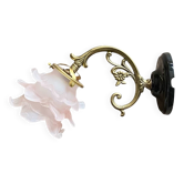 Swan neck wall light in brass with rose petal glass shade.