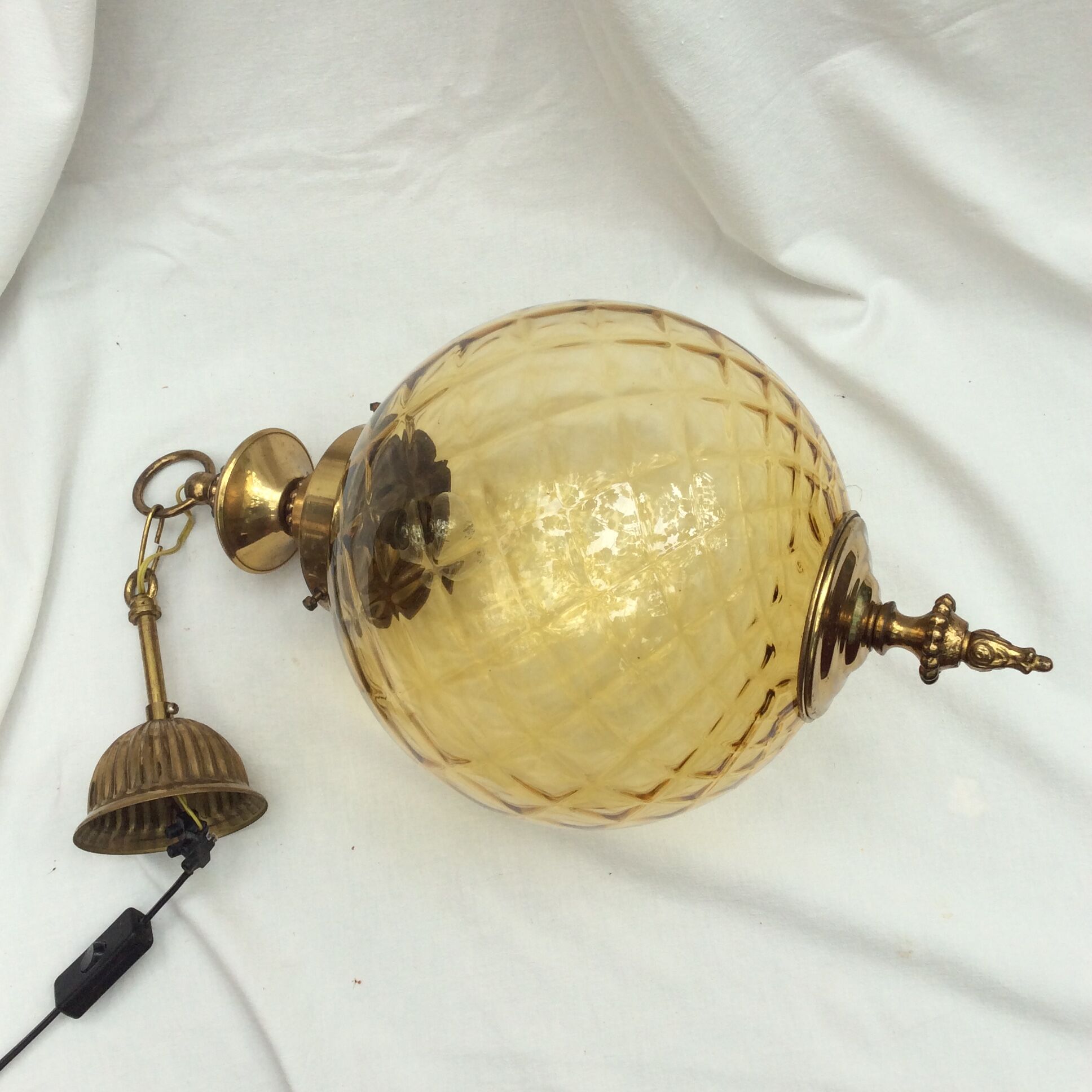 Amber glass suspension with brass