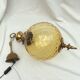 Amber glass suspension with brass
