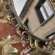 2 antique oval mirrors in heavy metal