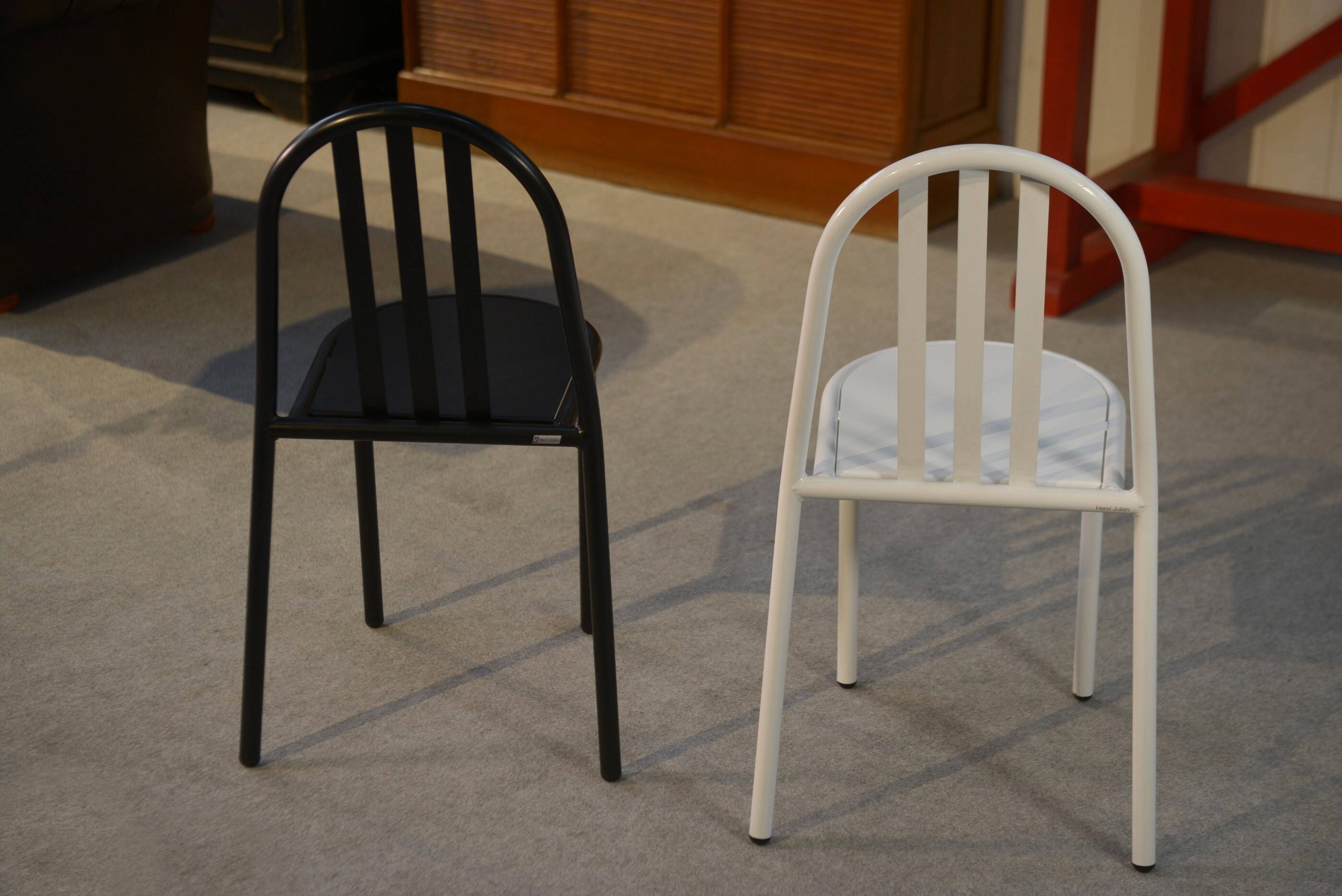 Pair of white and black chairs by Mallet Stevens