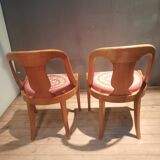 Pair of light wood gondola chairs