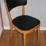 5 baumann chairs with large backs in black faux leather.