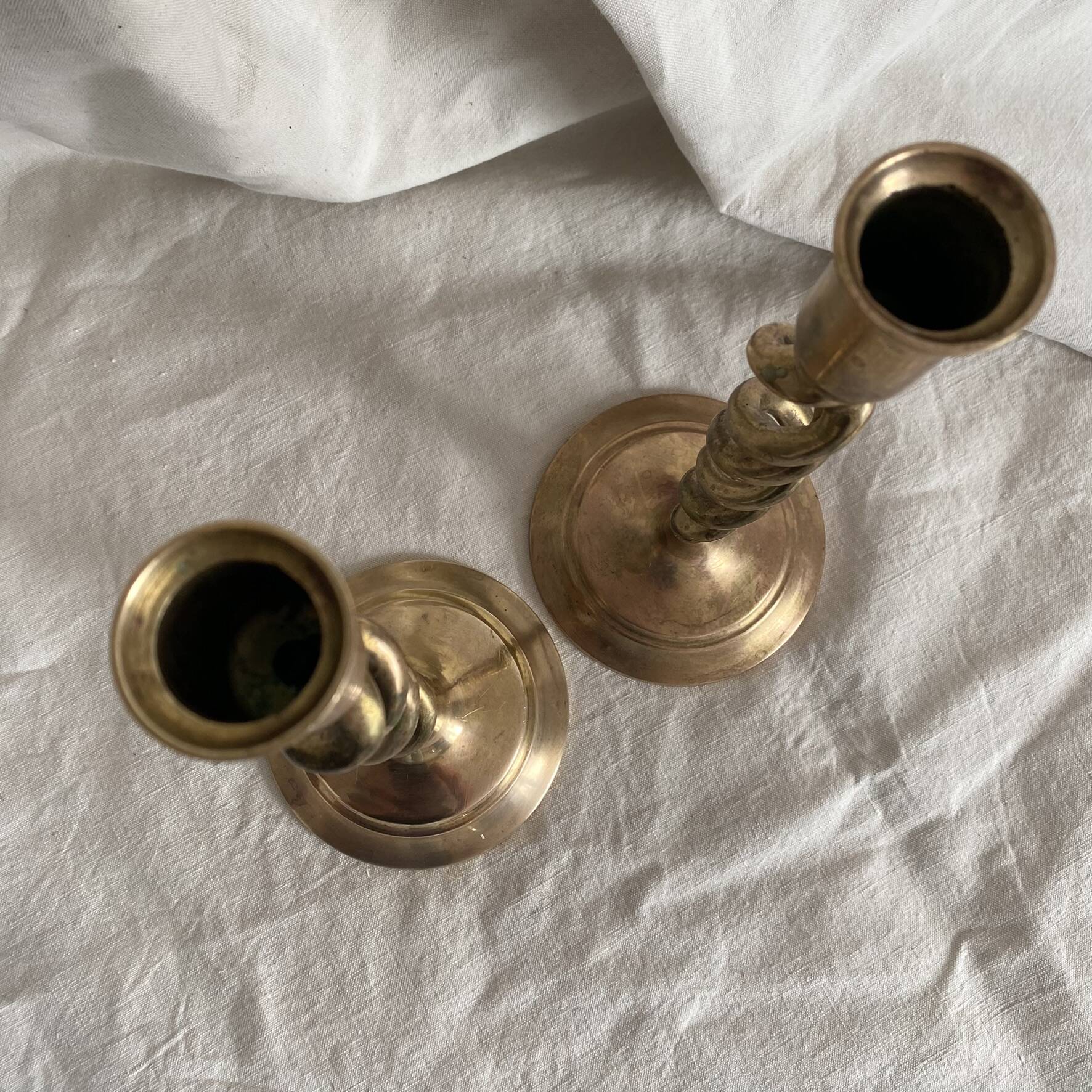 Pair of twisted brass candlesticks