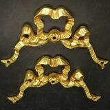 Pair of pediments with Louis XVI style knot in gilded bronze