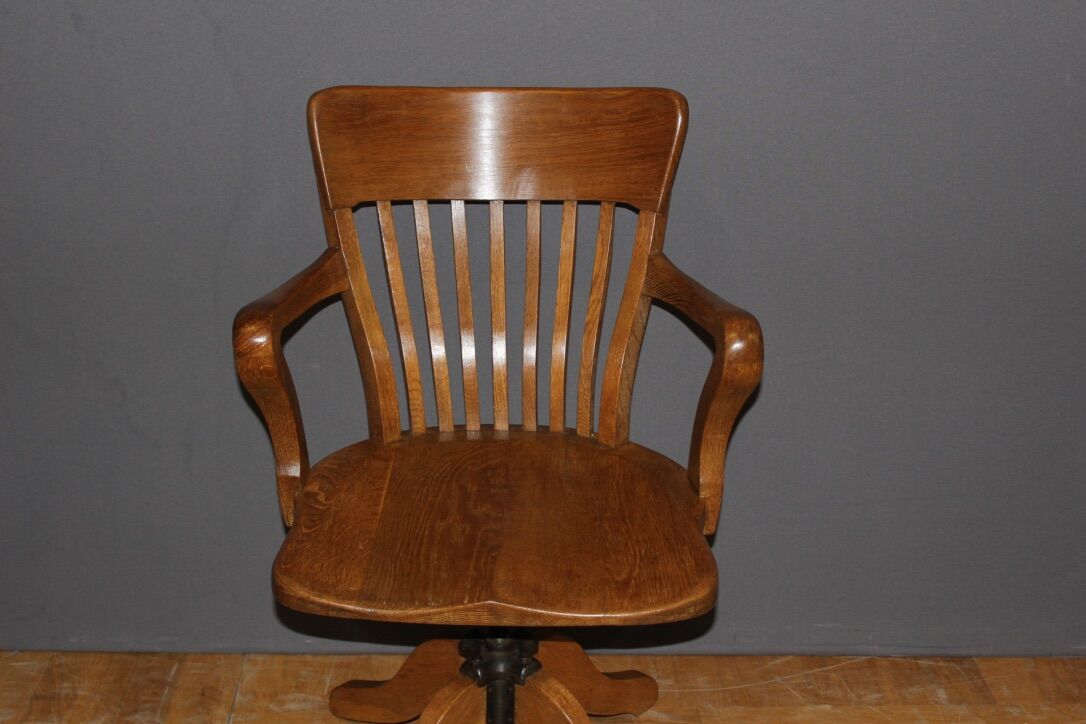 Rotating oak office chair circa 1930