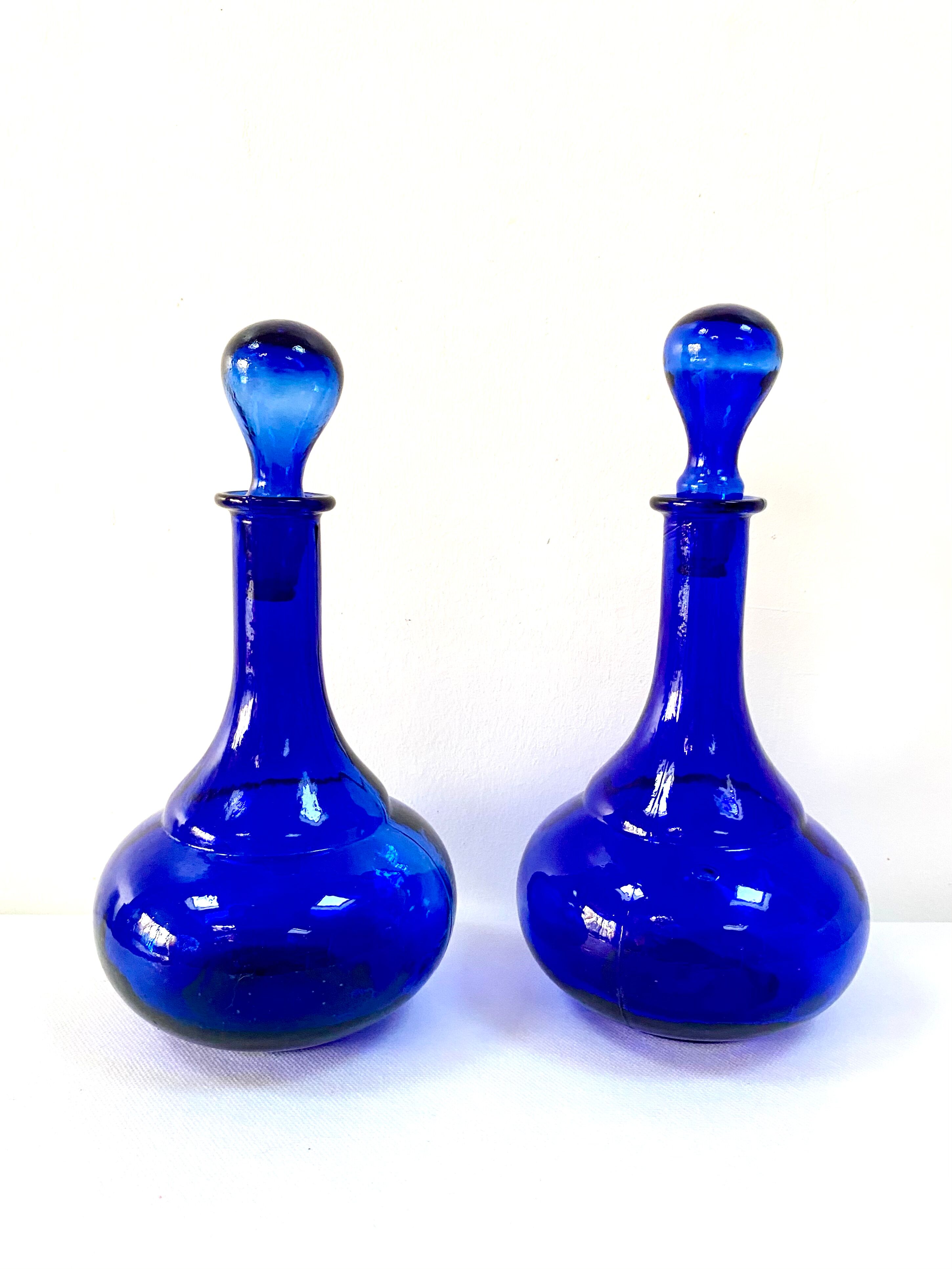 Antique decanter made of cobalt blue glass