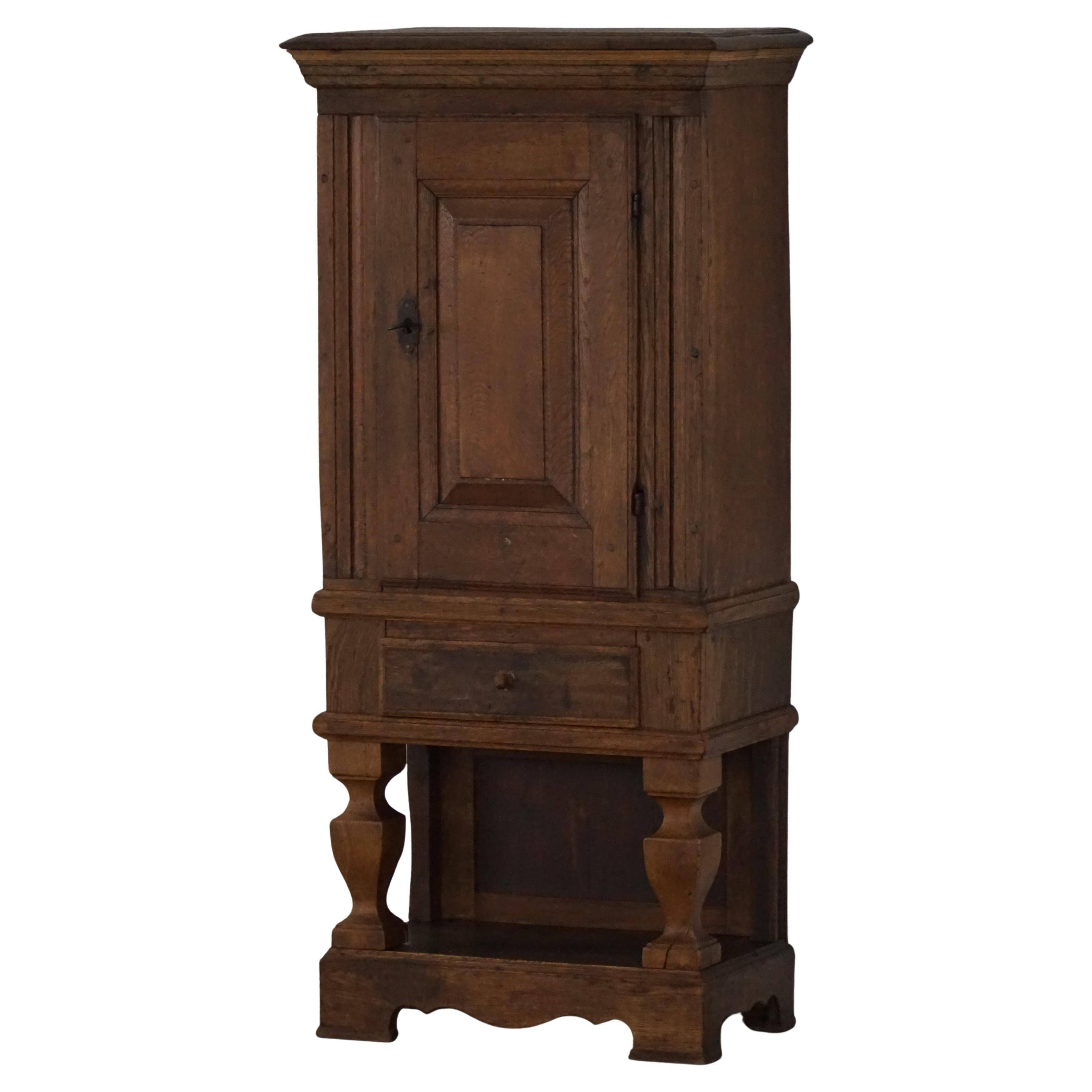 French rustic furniture in solid oak from the mid-19th century with panelled doors, baroque style.