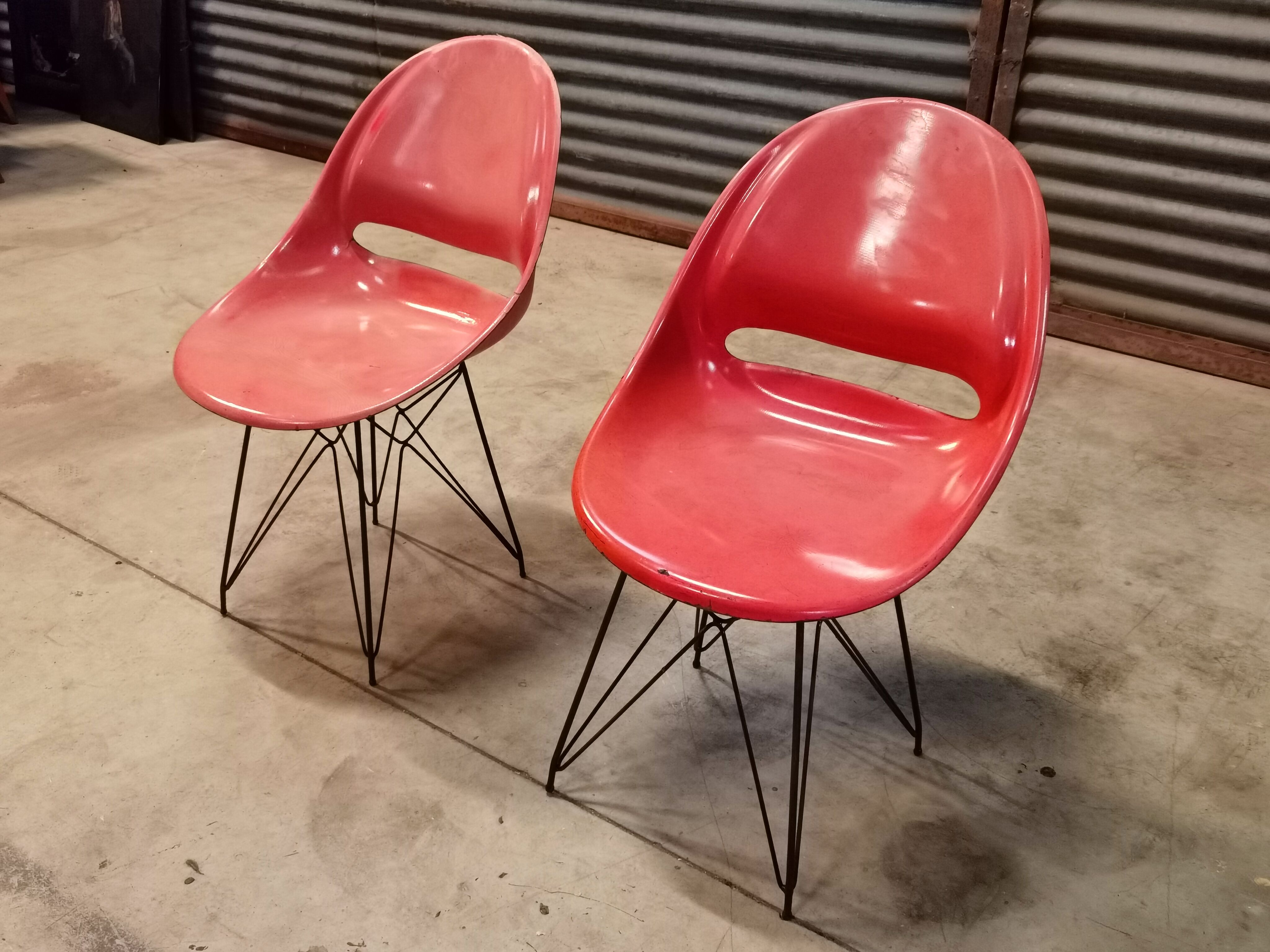 Pair of red chairs by Miroslav Navràtil for Vertex 1959