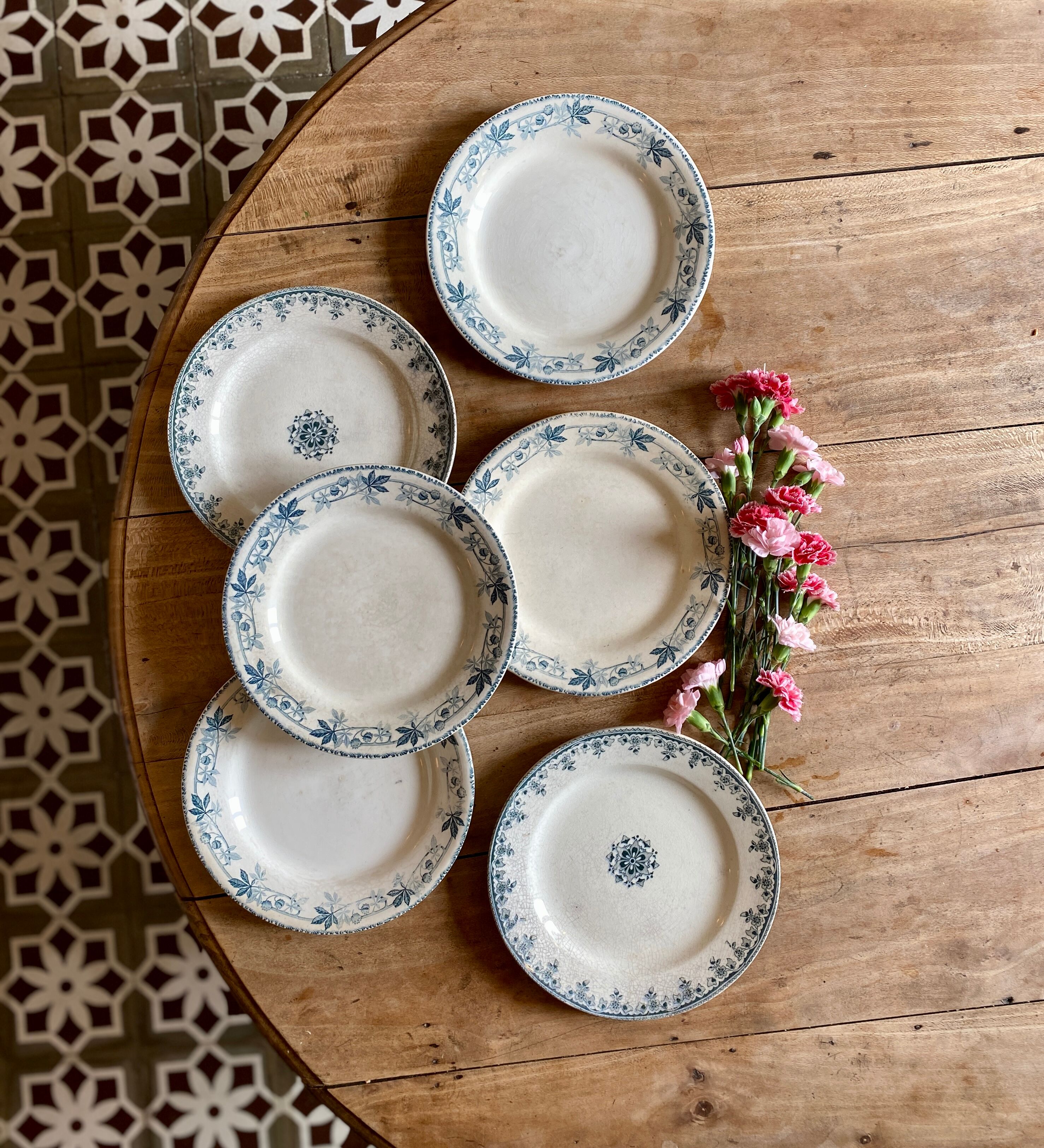 Set of 6 mismatched old iron earth flat plates