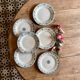 Set of 6 mismatched old iron earth flat plates