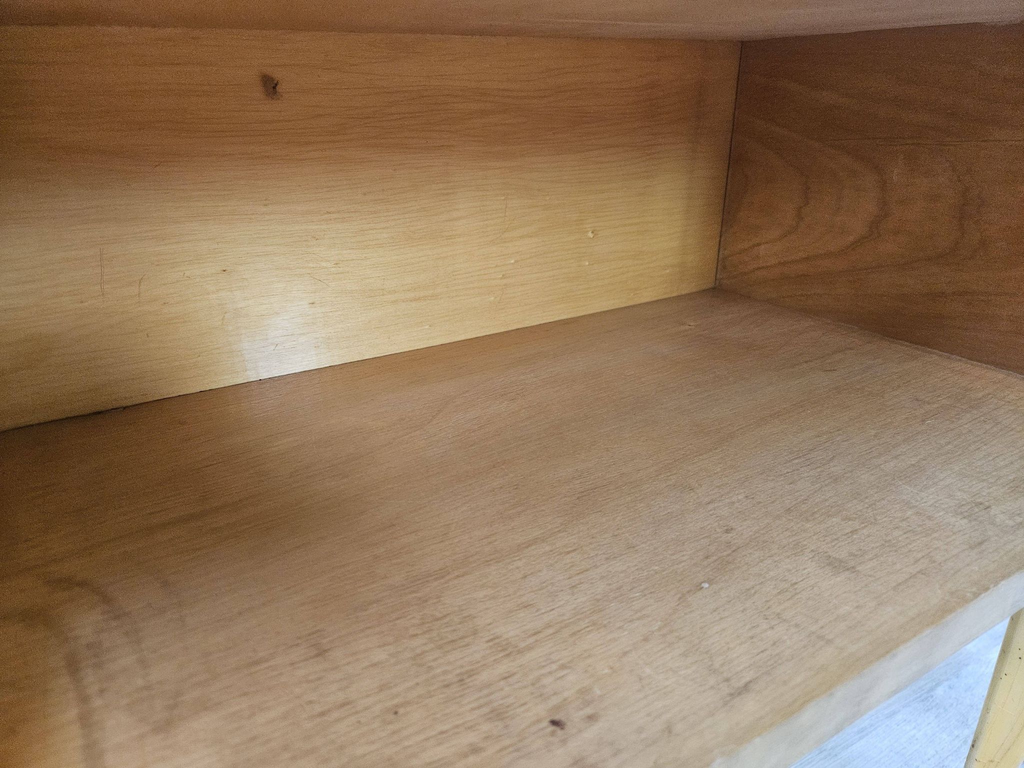 Pair of maple bedside tables from the 1950s with mirrored tops.