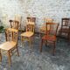 Set of 8 mismatched bistro chairs
