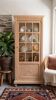 Antique glass-fronted cabinet with crossbars / display cabinet