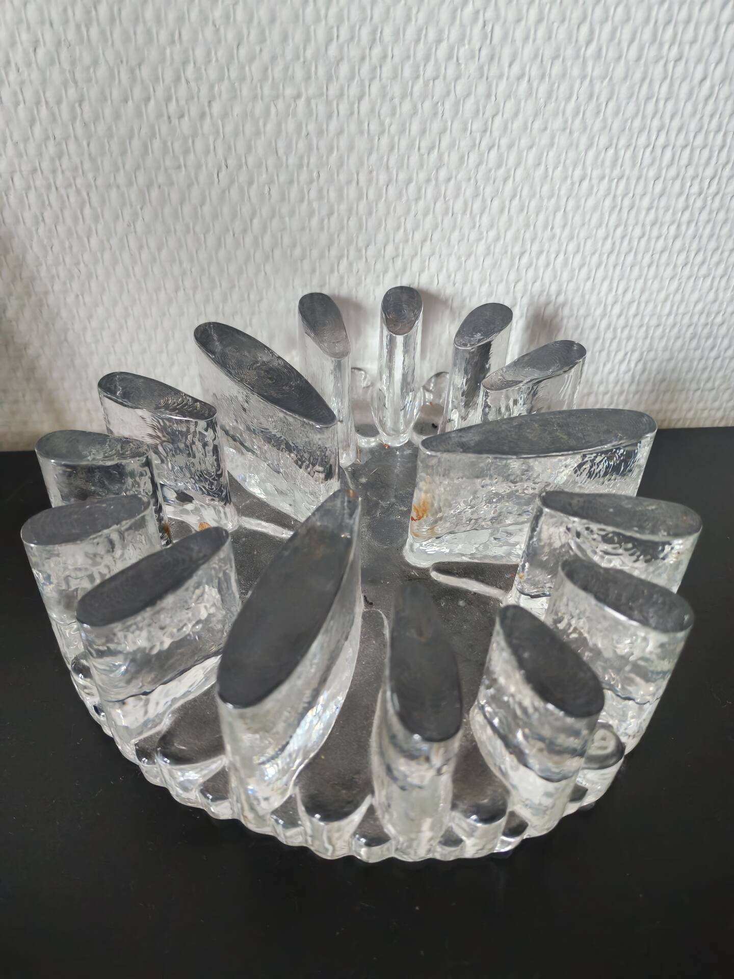 Large glass candle holder in iceberg brutalist style.