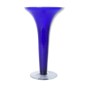 Blue glass vase with transparent foot