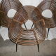 Fauteuil coquille en rotin et osier