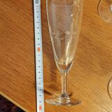 Six engraved crystal champagne flutes