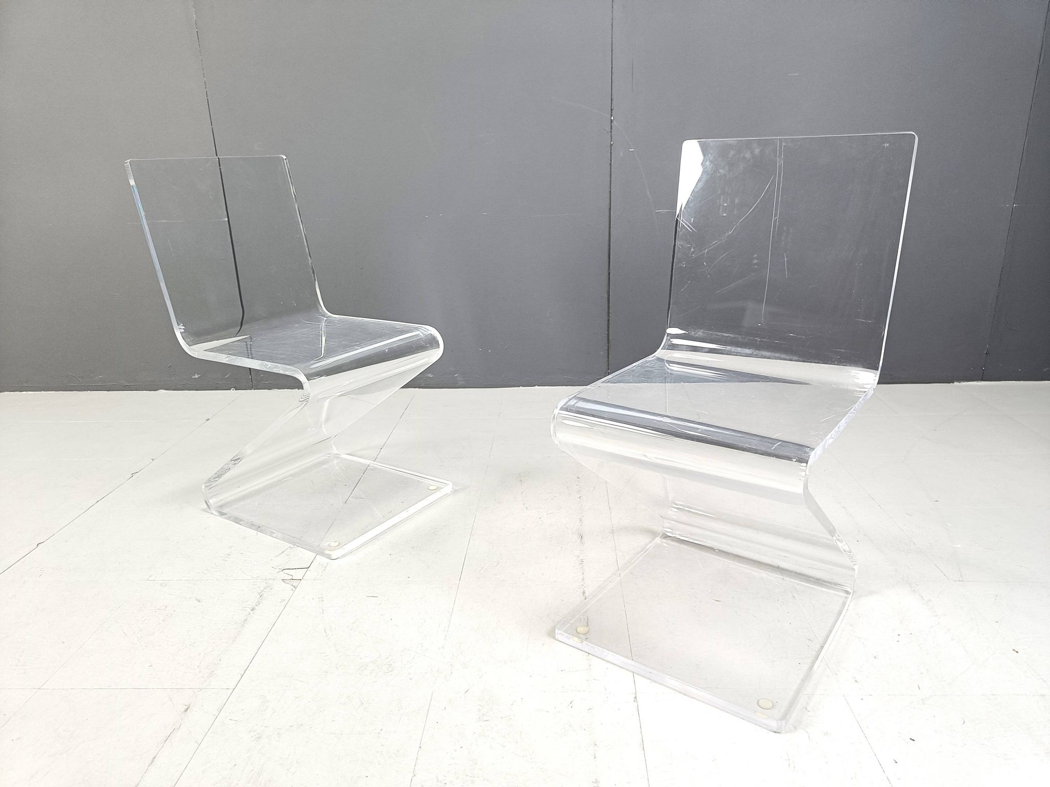 Pair of lucite zigzag dining chairs, 1980s
