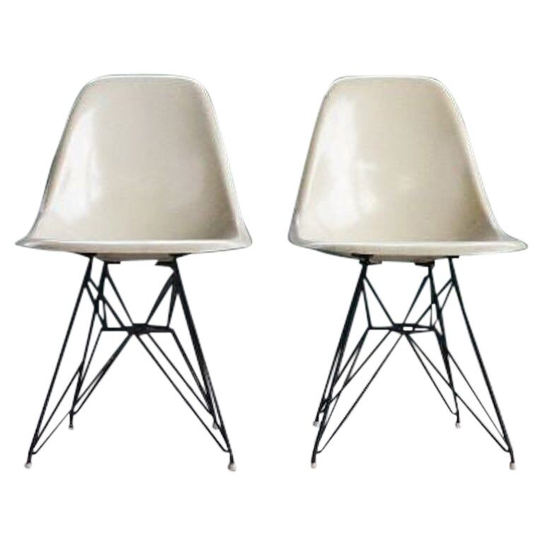 Pair of vintage Charles Eames eggshell and fiberglass chairs