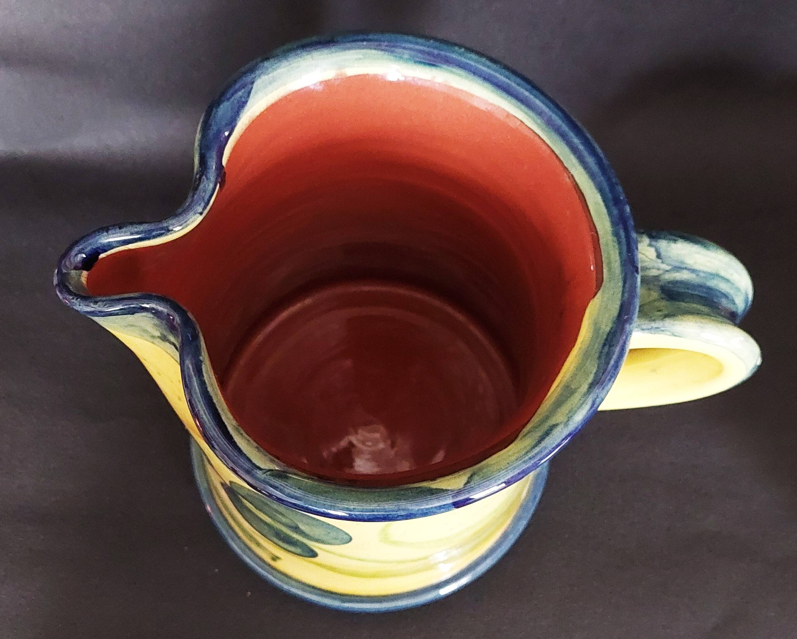 Vintage earthenware pitcher with a glossy finish, signature to be identified, 20th-century ceramics.