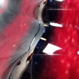 Large vintage blown glass ball vase with red and midnight blue flamed decor